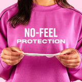Person wearing a pink sweatshirt with 'NO-FEEL PROTECTION' text, holding a Carefree liner.