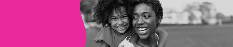 Laughing mom with happy child on her back